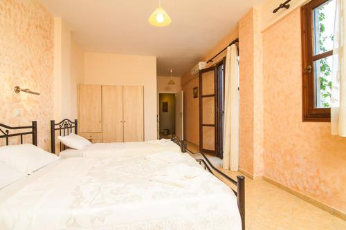 Cama o camas de una habitación en Sarris Villa