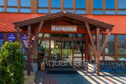 a store front with the entrance to a building at Aquamara Aquapark Tatralandia in Liptovský Mikuláš