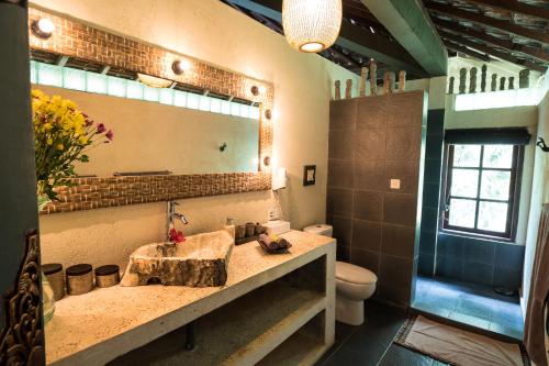 Koupelna v ubytování Villa Kalisat Resort