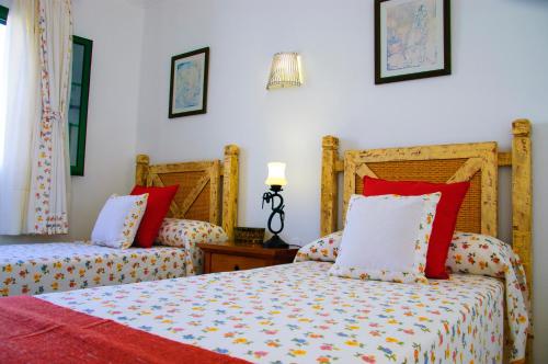 Säng eller sängar i ett rum på Villa Amanecer
