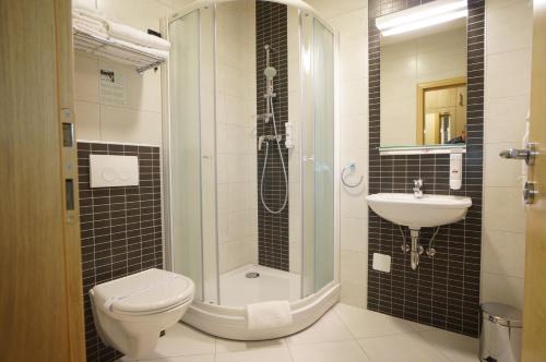 Koupelna v ubytování Hotel Calypso
