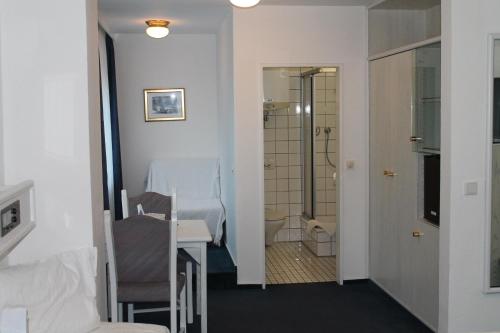 Kylpyhuone majoituspaikassa Hotel Windthorst