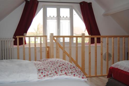 Ένα ή περισσότερα κρεβάτια σε δωμάτιο στο Chambre d'hotes Murielle