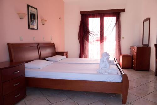 Posteľ alebo postele v izbe v ubytovaní Hotel Anna