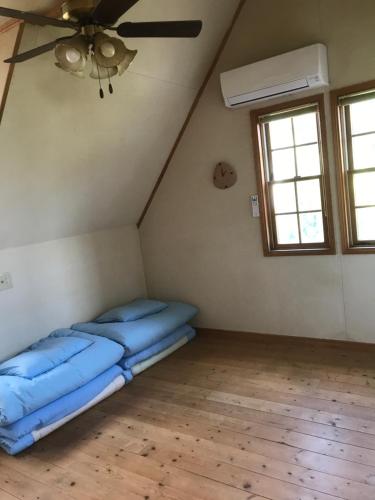 Postel nebo postele na pokoji v ubytování Guesthouse Irago