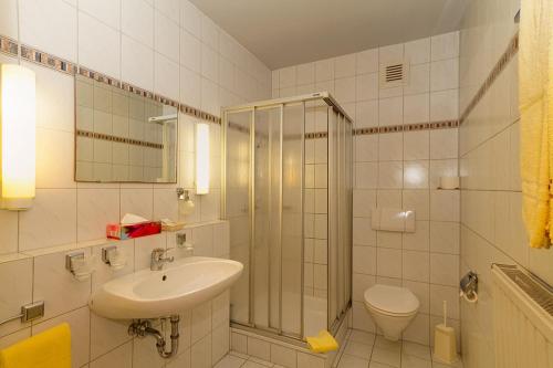 Koupelna v ubytování Hotel Tilman