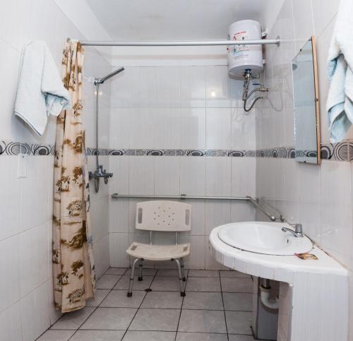 Kylpyhuone majoituspaikassa Hostal Iquique