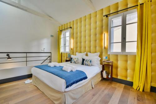 Ένα ή περισσότερα κρεβάτια σε δωμάτιο στο Sweett - Tardieu