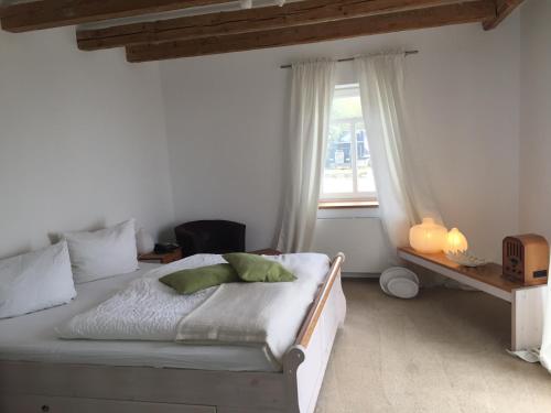 Un pat sau paturi într-o cameră la Schwedenfrieden