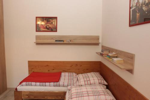 Postel nebo postele na pokoji v ubytování Tatranka a Horalka
