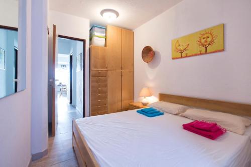 Tempat tidur dalam kamar di Casa i Cormorani- Fantastica vista sul golfo dell'Asinara