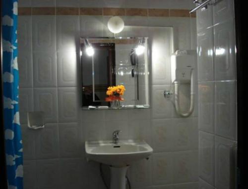 Ванная комната в Hotel Hellinis