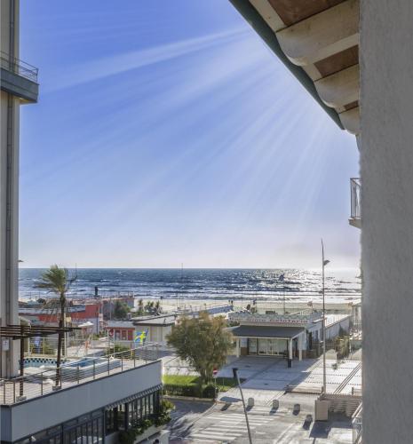 a view of the beach from a building at Hotel Lido Inn in Lido di Camaiore