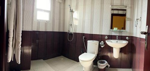 Ванна кімната в Wanasa Inn Apartments