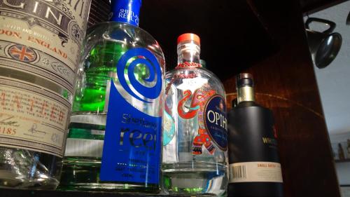 a group of bottles of alcohol on a table at The Furze Bush Inn in Newbury