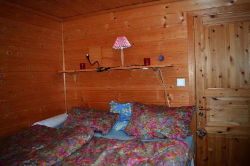 A bed or beds in a room at Haukeli Mountain Cabin