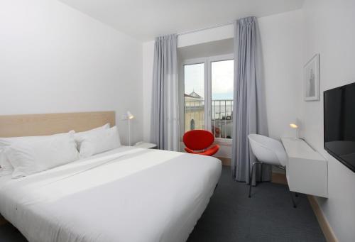 Postel nebo postele na pokoji v ubytování Hotel Convento do Salvador