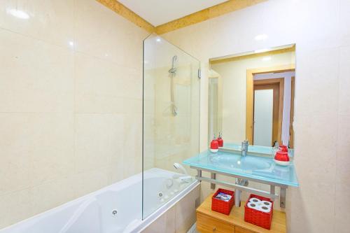 Ванная комната в Apartamento em Quinta da Barracuda