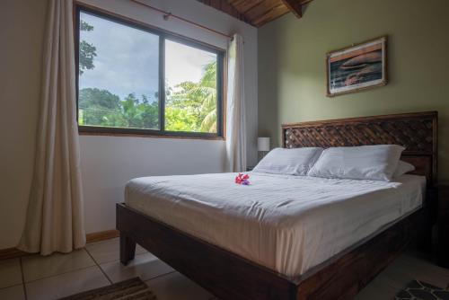 سرير أو أسرّة في غرفة في Villas Solar