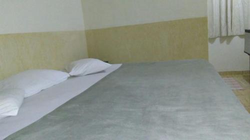 Postel nebo postele na pokoji v ubytování Hotel Vitalle