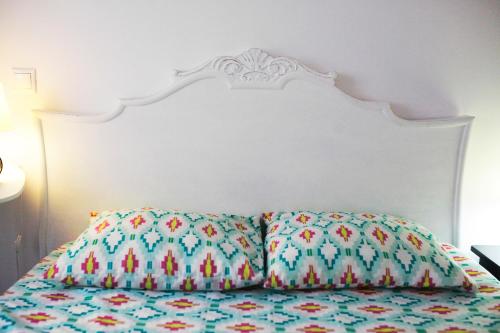 Кровать или кровати в номере StayAlicante