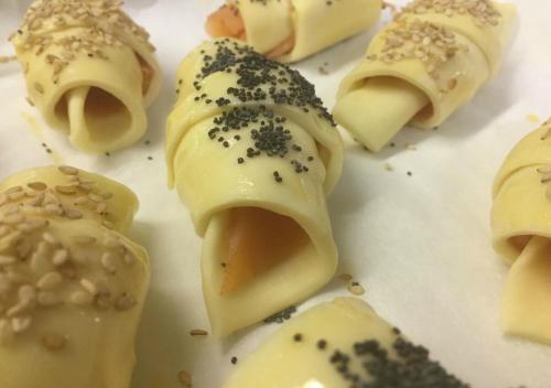 a bunch of pastries sitting on a white plate at Hotel Storyville - svago e convenzioni aziendali in Cinquale
