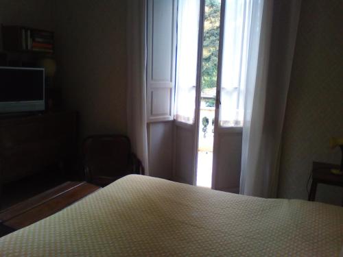 Postel nebo postele na pokoji v ubytování B&B Villa Gualterio