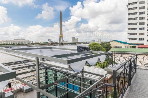 a view of the eiffel tower from the roof of a building at V Varee Bangkok in Bangkok