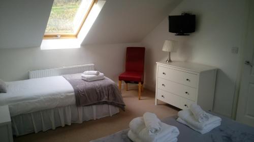 Postel nebo postele na pokoji v ubytování SunnySide-Cottage