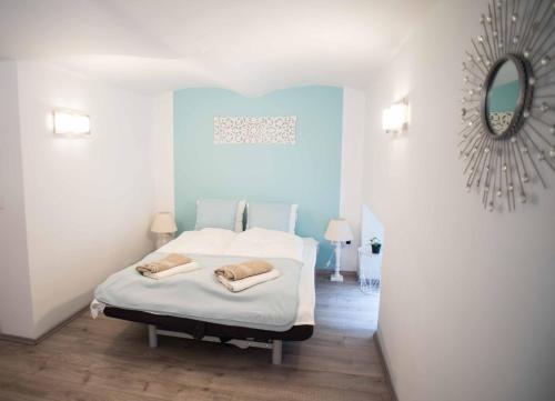 Posteľ alebo postele v izbe v ubytovaní Great Trees Apartment