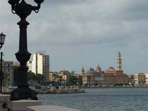 a view of a city with a river and buildings at 1910 B&B in Bari