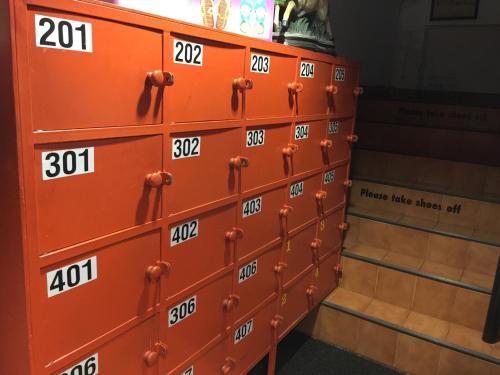 a chest of drawers with the numbers on them at KC guest house in Bangkok