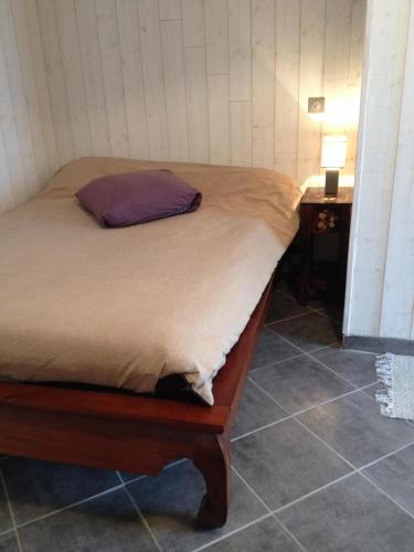 Postel nebo postele na pokoji v ubytování Studio chez Jean-Michel
