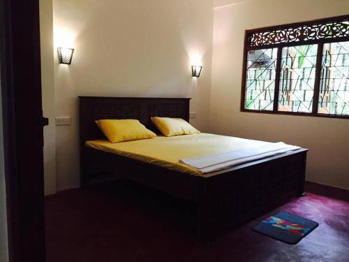 Katil atau katil-katil dalam bilik di Nature Villa