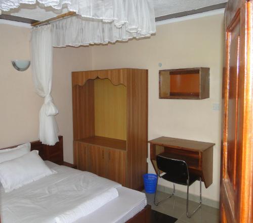 Ein Bett oder Betten in einem Zimmer der Unterkunft Easy Sleep Guesthouse
