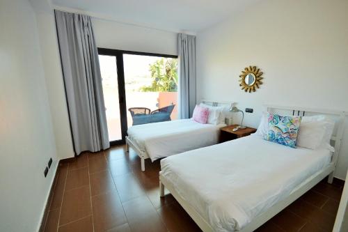 Cama o camas de una habitación en Tabaibas1 @ Salobre Golf