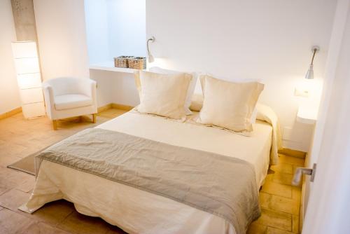 Säng eller sängar i ett rum på Alojamientos Don Alvaro