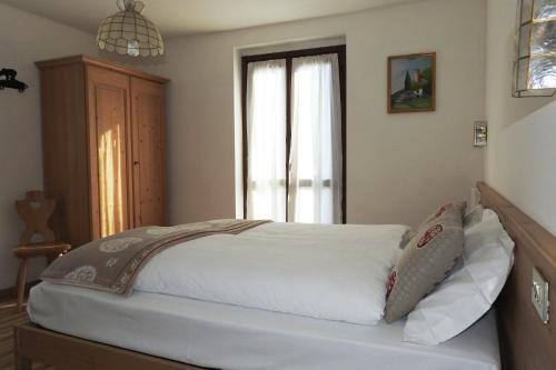 Postel nebo postele na pokoji v ubytování Casa Salvaterra Affittacamere