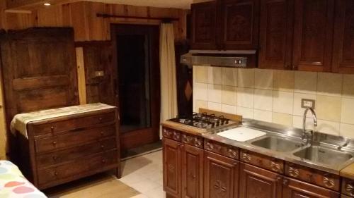 Kuchyň nebo kuchyňský kout v ubytování Taverna Semon