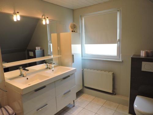 Ванна кімната в Venez loger chez l'habitant au centre de l'Alsace, à côté d'Europa Park !