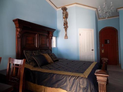 Ein Bett oder Betten in einem Zimmer der Unterkunft Poco Cielo Hotel