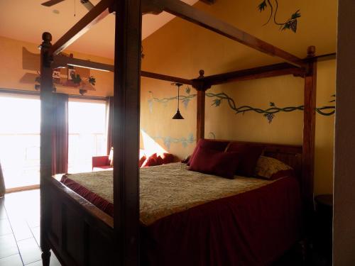 Ein Bett oder Betten in einem Zimmer der Unterkunft Poco Cielo Hotel