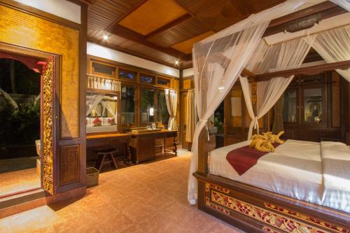 Postel nebo postele na pokoji v ubytování Ubud Terrace