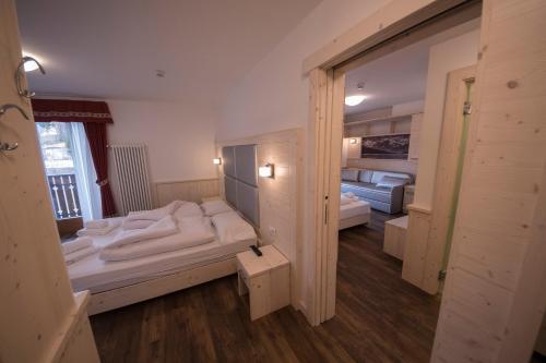 Una cama o camas en una habitación de Hotel Niagara