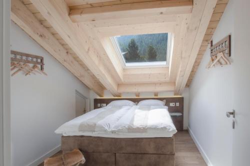 Een bed of bedden in een kamer bij Haus Andorra
