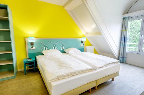 Postel nebo postele na pokoji v ubytování Center Parcs Nordseeküste Bremerhaven