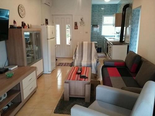 Kuchyňa alebo kuchynka v ubytovaní Gogi apartman