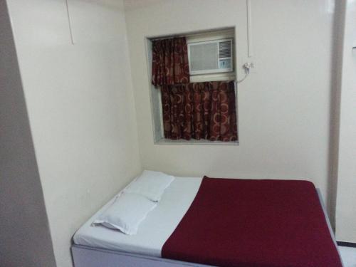 Katil atau katil-katil dalam bilik di New Metro Guest House