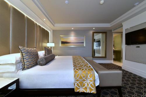 Katil atau katil-katil dalam bilik di Sandton Sun and Towers