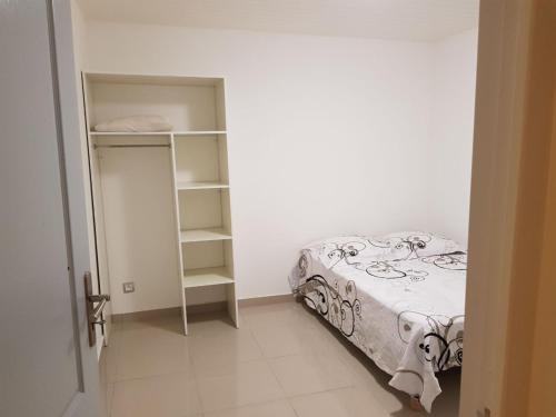 Ένα ή περισσότερα κρεβάτια σε δωμάτιο στο Villa Fleur de Canne